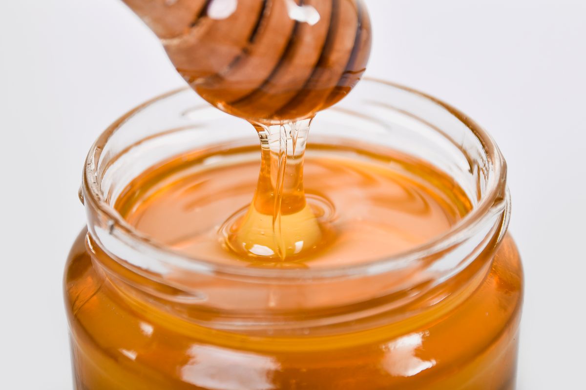 Raw honey being jarred